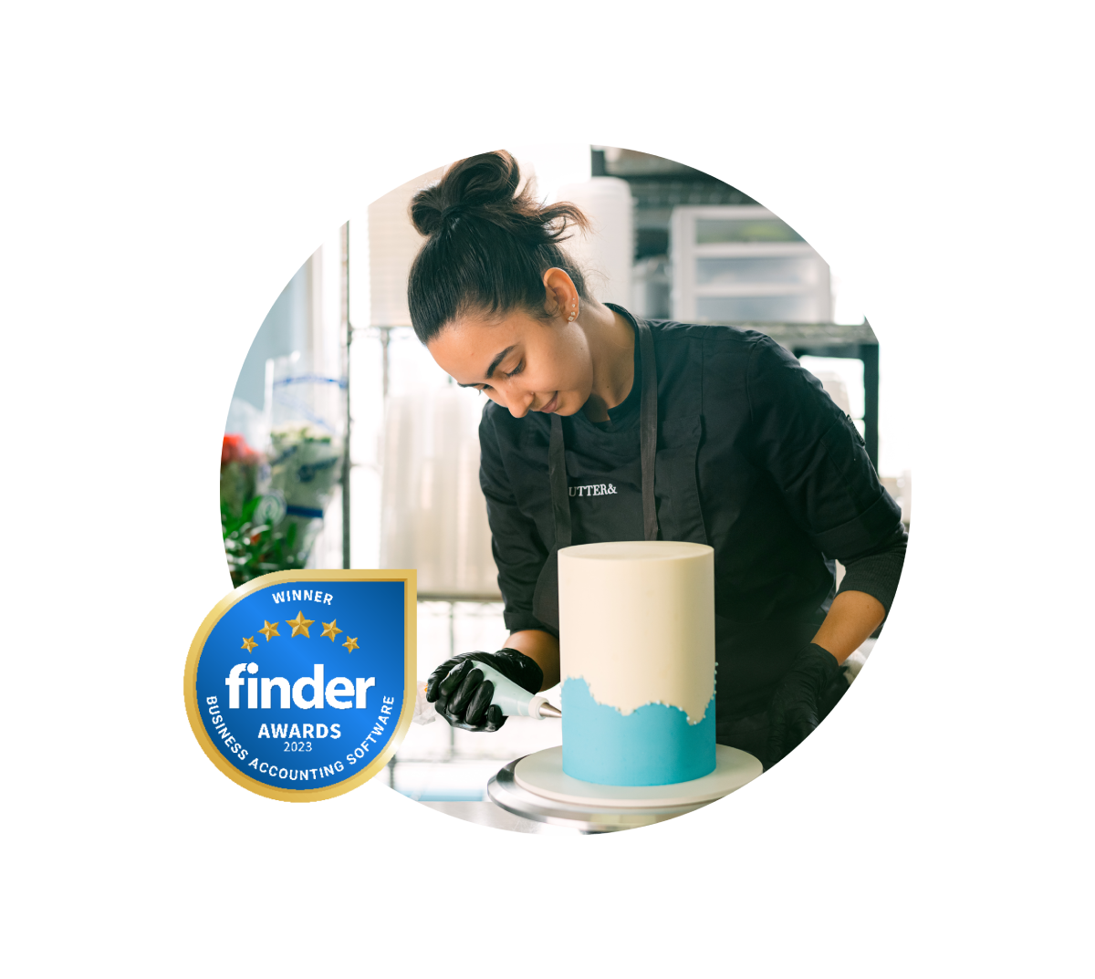 A Xero user decorating a cake with blue icing. Social proof award badge on the corner of the image.
